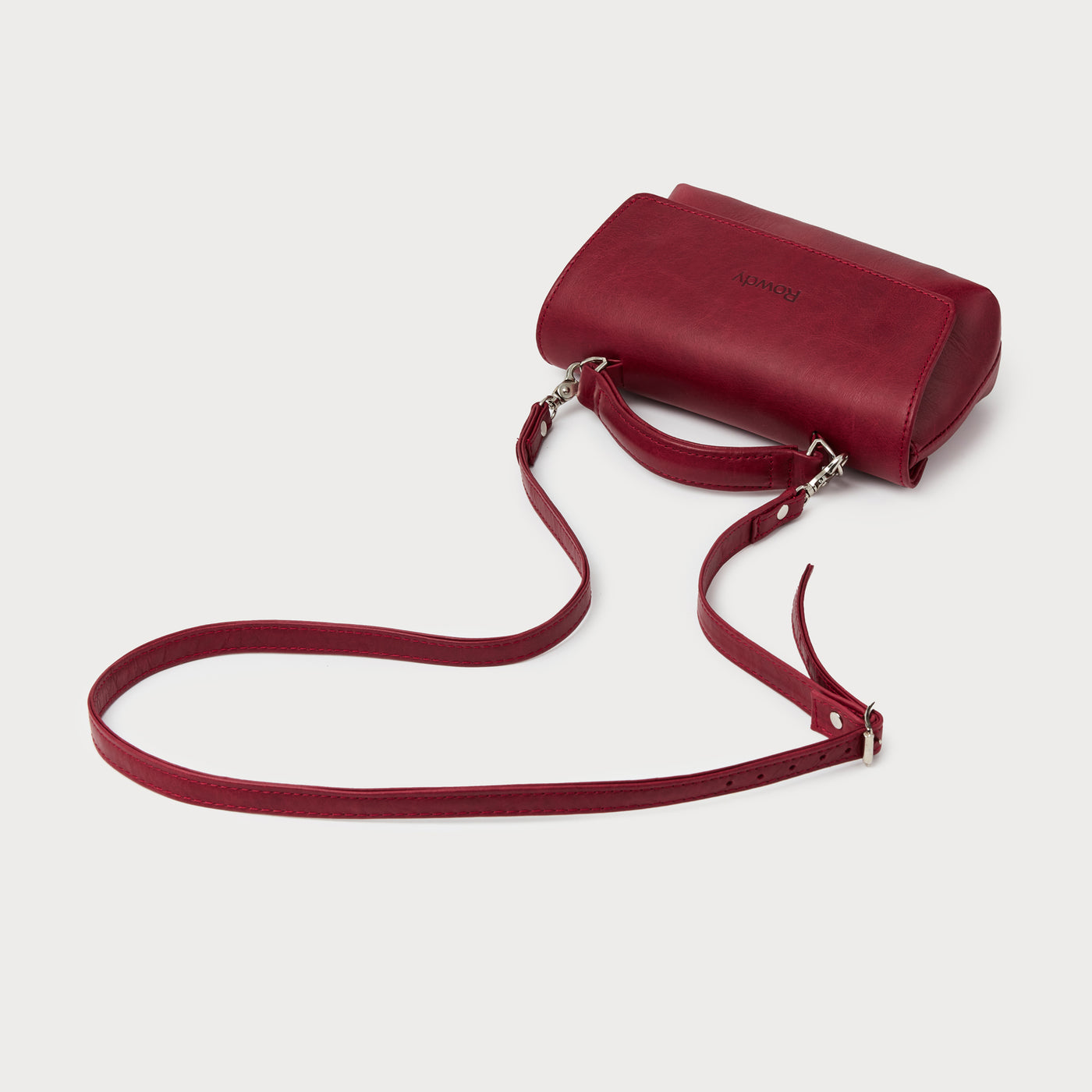 Carry by hand or wear crossbody.