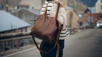 Brown Rowdy Tote Crossbody with striped sweater